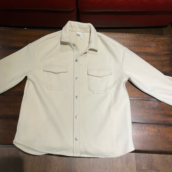 Beige jacket. - Picture 1 of 3